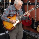 Ageless Harmony: A Grandpa’s Guitar Store Performance