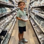 BOY SPENDS ALL HIS SAVINGS ON BOOTS FOR POOR CLASSMATE