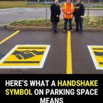 Here’s what a handshake symbol on a parking space means