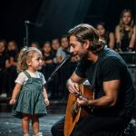 In a spontaneous moment, the superstar invites a little girl to sing “You Raise Me Up.” Within seconds, the girl captivates the audience and brings down the house with her rendition.