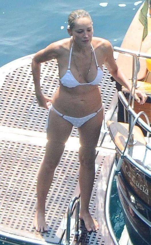 Sharon Stone rocks bikini at 66