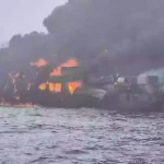 Oil tanker bursts into flames after colliding with cargo ship leaving at least 32 casualties